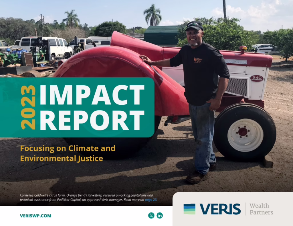 A farmer smiles with pride while patting his new red tractor. Text: 2023 Impact Report Focusing on Climate and Environmental Justice